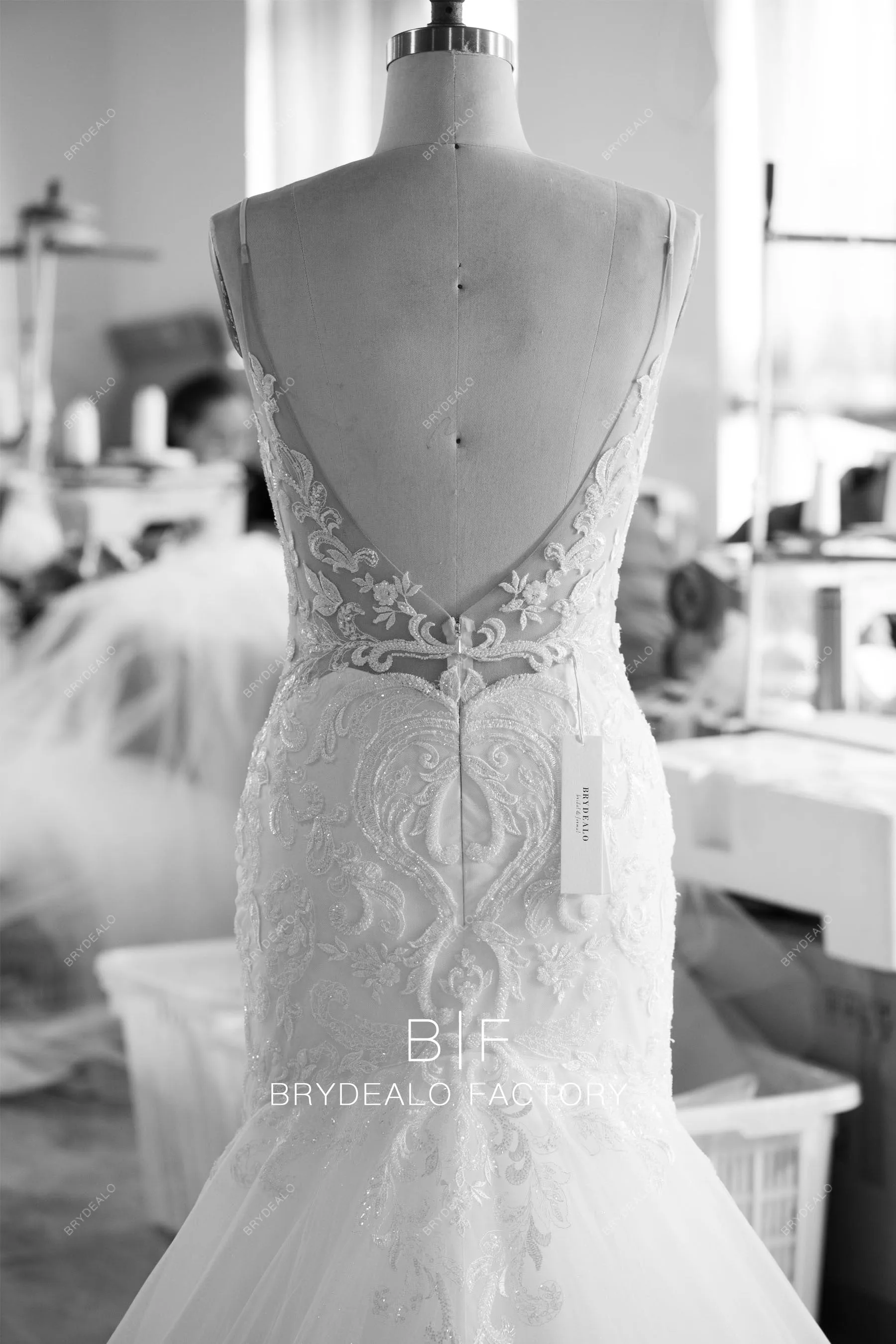 Shimmery Plunging Designer Open Back Lace Trumpet Wedding Dress